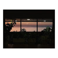a view of the ocean through a window