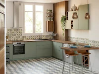 a kitchen with a wooden floor and a checkered floor
