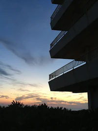 a view of a building at sunset
