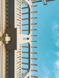the top of a building with a blue sky